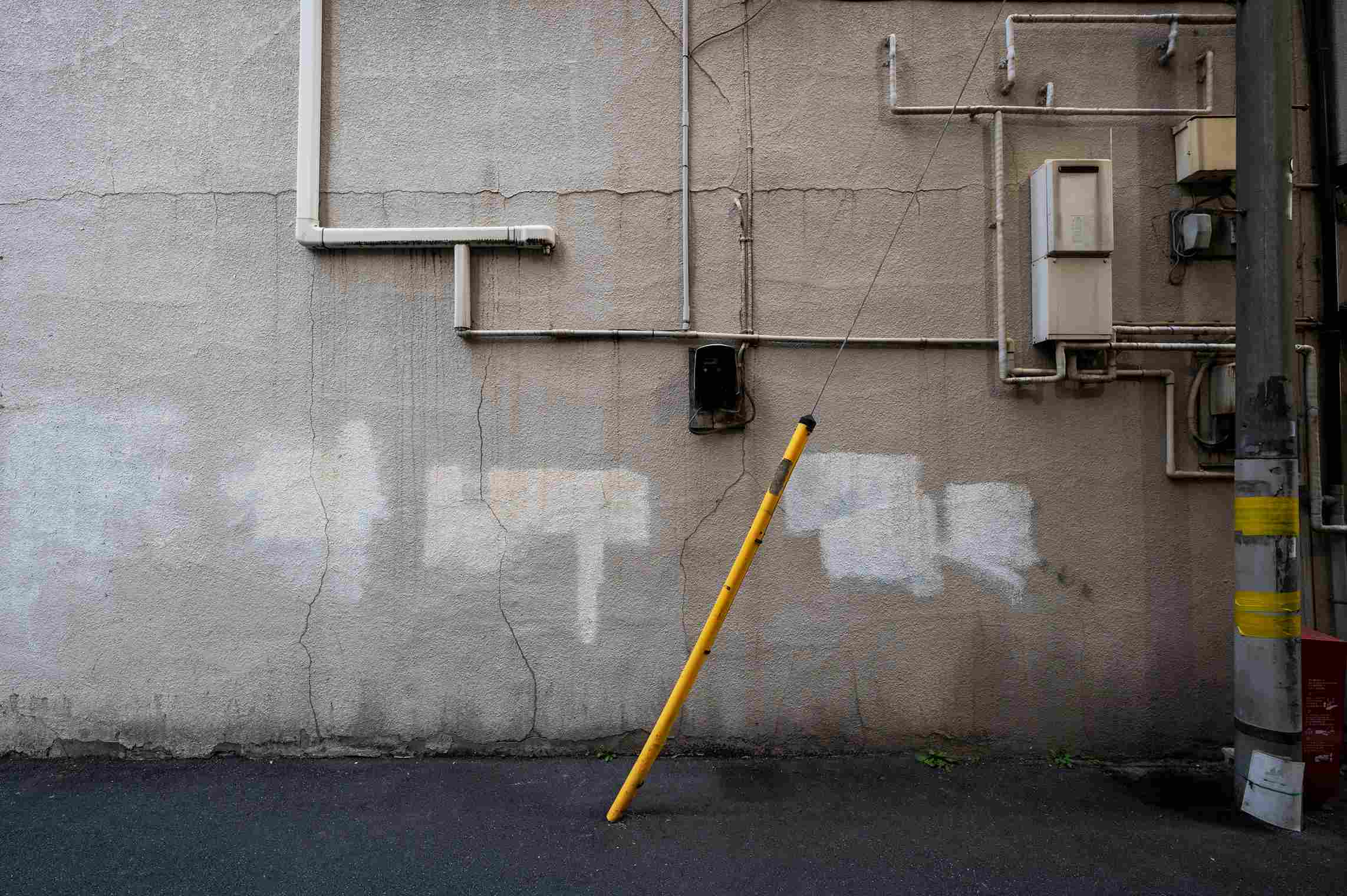 Radon Mitigators Bore Holes in Basement Walls